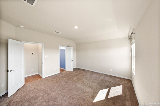 unfurnished bedroom featuring recessed lighting, visible vents, carpet floors, and baseboards