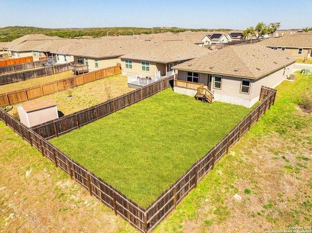 view of yard featuring a residential view and fence private yard