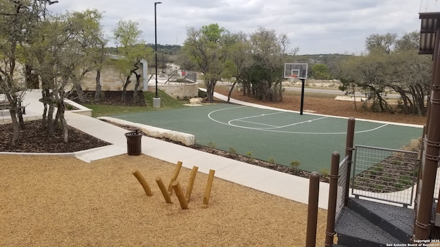 view of basketball court with community basketball court