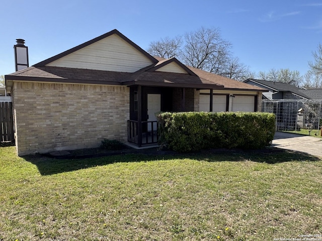 ranch-style house featuring brick siding, a front lawn, fence, concrete driveway, and a garage