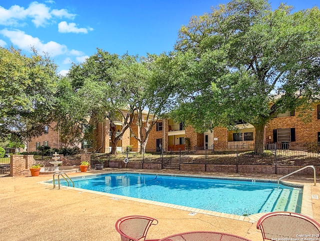 community pool with fence