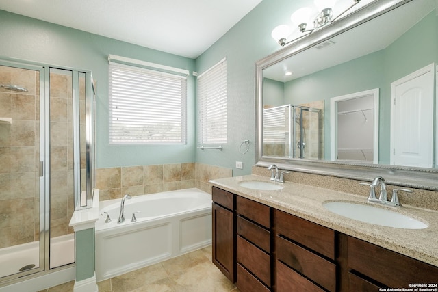 12535 Quarter J, San Antonio, TX 78254 - full bath with a bath, tile patterned flooring, a shower stall, and a sink