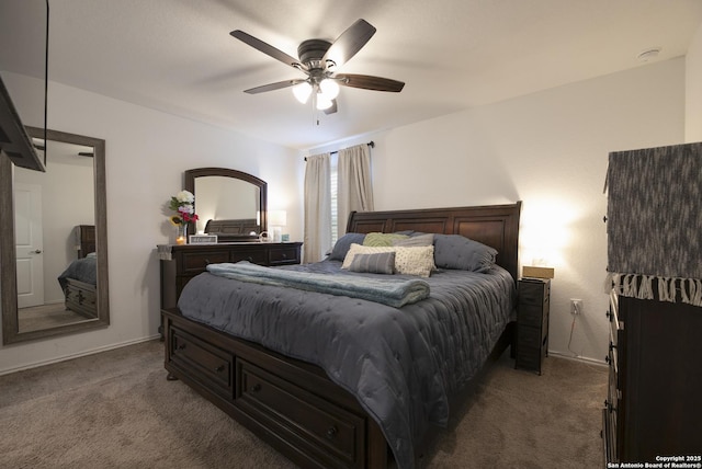 carpeted bedroom featuring a ceiling fan