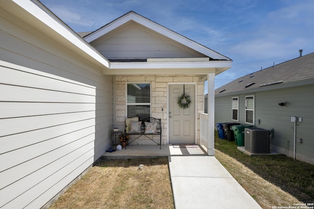 doorway to property with central air condition unit