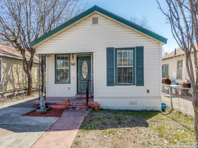 bungalow featuring crawl space and fence