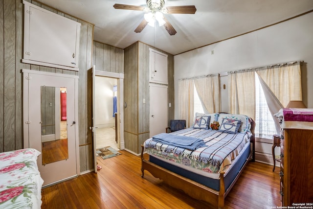 bedroom featuring ceiling fan and hardwood / wood-style floors