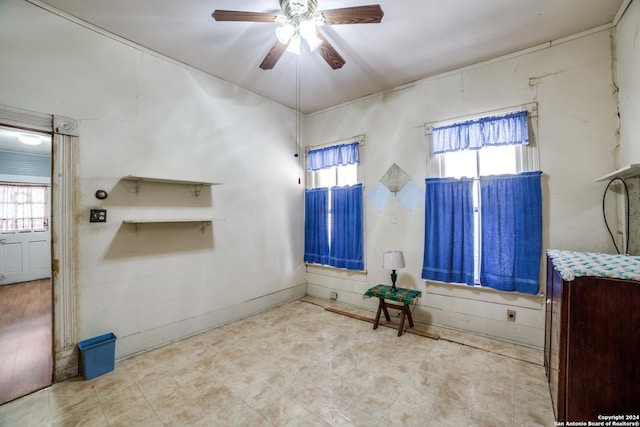 interior space featuring a wealth of natural light and ceiling fan