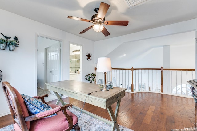 office space with wood-type flooring and a ceiling fan