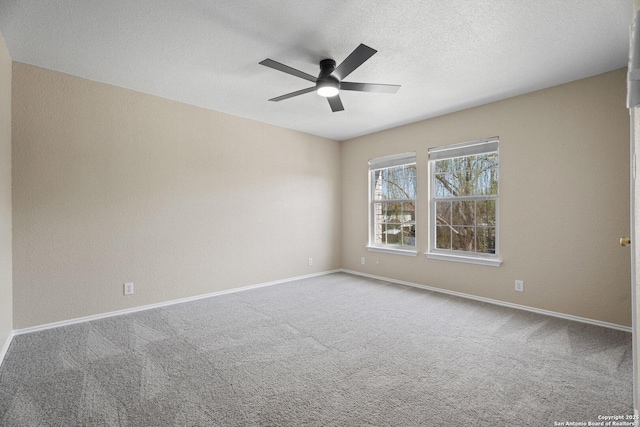 1967 Club Xing, New Braunfels, TX 78130 - empty room featuring baseboards, carpet floors, a textured ceiling, and ceiling fan