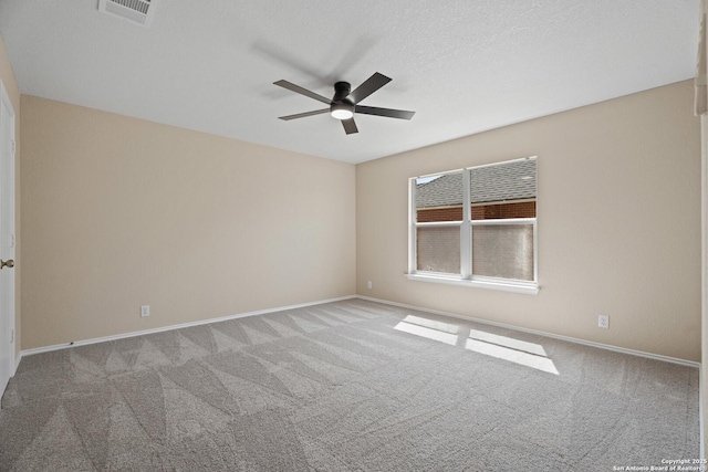 1967 Club Xing, New Braunfels, TX 78130 - carpeted empty room featuring visible vents, baseboards, and a ceiling fan