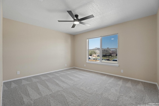 1967 Club Xing, New Braunfels, TX 78130 - unfurnished room featuring baseboards, carpet floors, a textured ceiling, and ceiling fan
