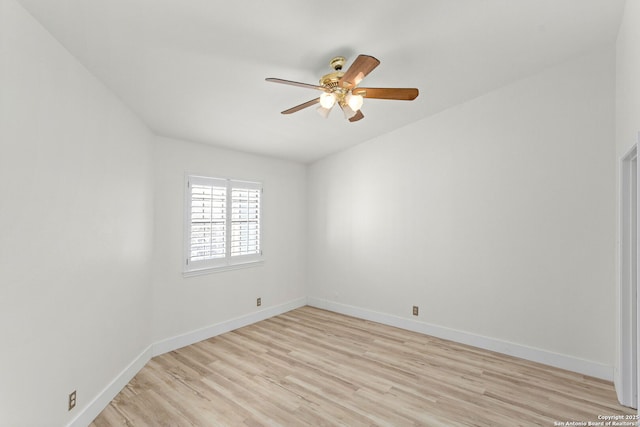 unfurnished room with light wood finished floors, baseboards, and ceiling fan