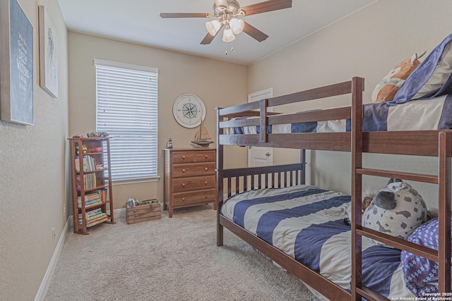 bedroom featuring carpet flooring, ceiling fan, and baseboards