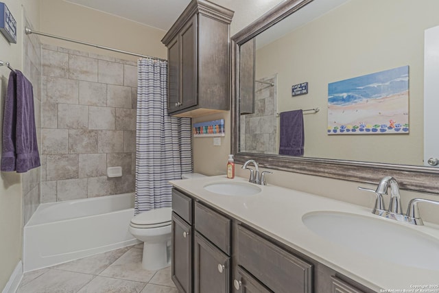 full bathroom featuring a sink, toilet, shower / bath combo, and double vanity