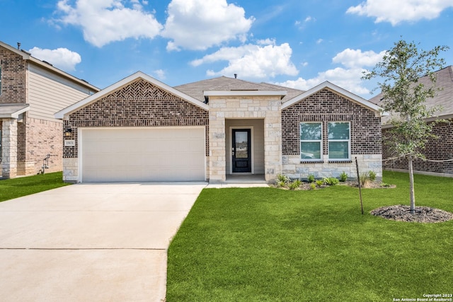 view of front facade with concrete driveway, a front lawn, a garage, stone siding, and brick siding