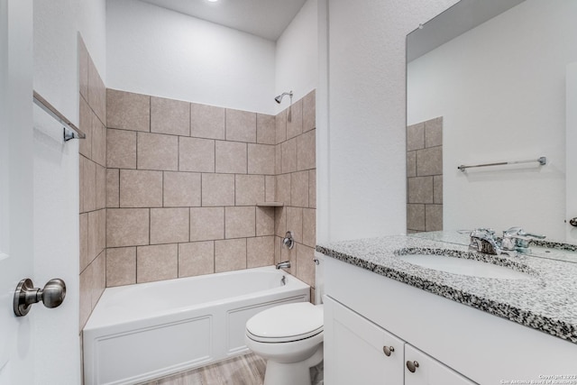 full bathroom with vanity, shower / tub combination, toilet, and wood finished floors