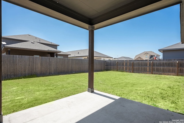 view of yard with a fenced backyard and a patio area