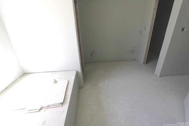 interior space featuring concrete floors