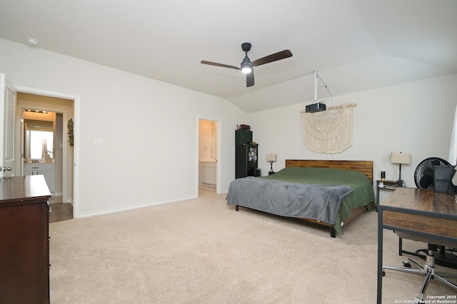 bedroom featuring light colored carpet, baseboards, lofted ceiling, and a ceiling fan