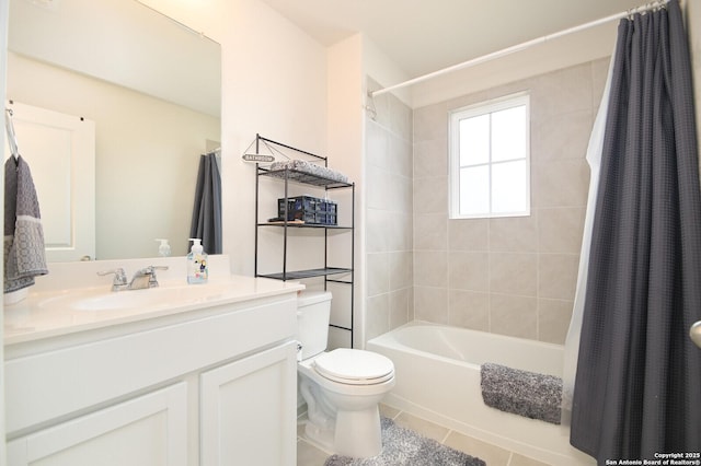 full bathroom featuring tile patterned floors, vanity, toilet, and shower / tub combo with curtain