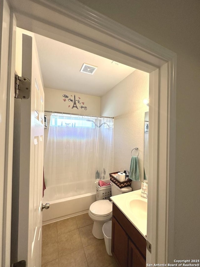 full bath with tile patterned floors, visible vents, toilet, shower / bath combo, and vanity