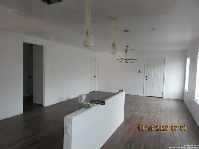 kitchen featuring open floor plan and wood finished floors