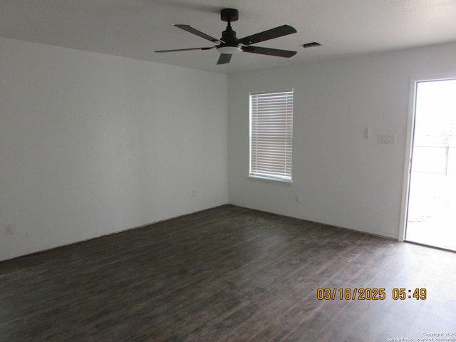 spare room featuring ceiling fan and wood finished floors