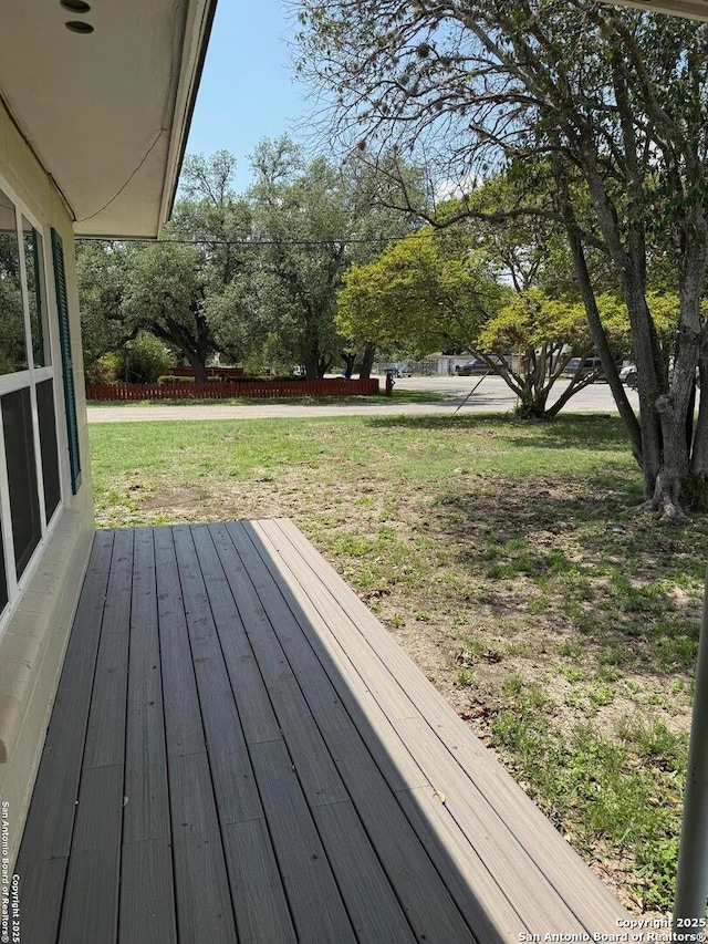 401 E Fourth St, Camp Wood, TX 78833 - wooden terrace featuring a yard