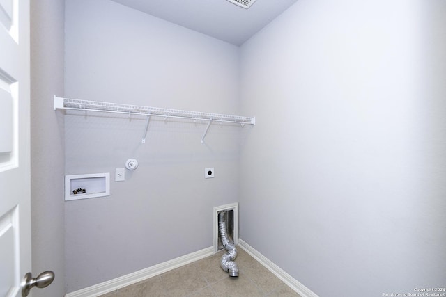 laundry room with baseboards, gas dryer hookup, washer hookup, laundry area, and electric dryer hookup