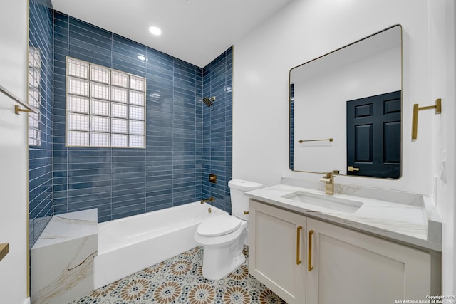 full bath featuring tile patterned floors, toilet,  shower combination, and vanity