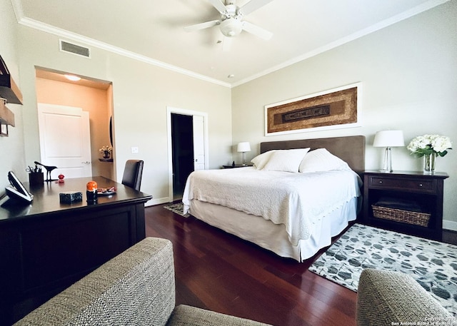 bedroom featuring visible vents, crown molding, baseboards, a ceiling fan, and dark wood-style flooring