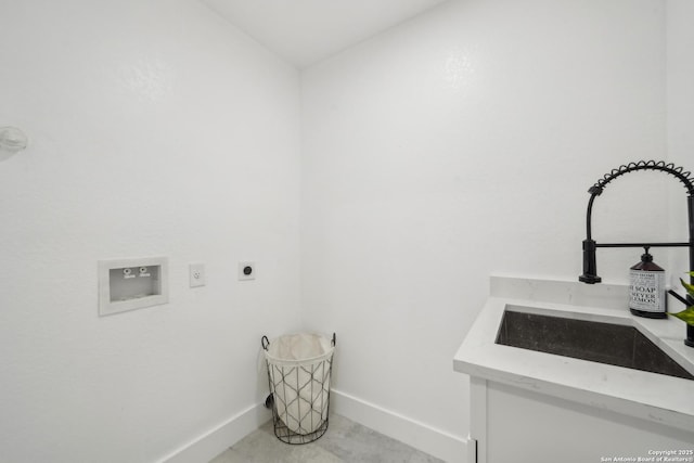 laundry area with hookup for a washing machine, baseboards, laundry area, a sink, and electric dryer hookup