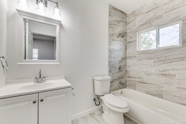 full bath with baseboards, toilet, shower / washtub combination, and vanity