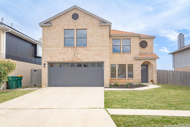 traditional-style home featuring fence, driveway, a front lawn, a garage, and brick siding