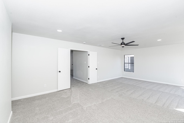 spare room with recessed lighting, baseboards, carpet, and ceiling fan