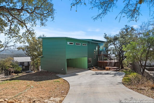 301 Vip Dr, Canyon Lake, TX 78133 - view of property with concrete driveway and stairs
