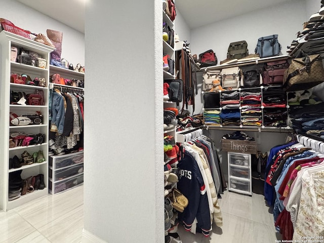 walk in closet featuring tile patterned floors