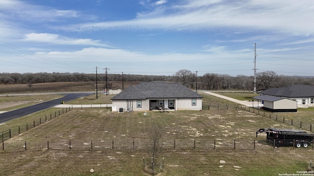 view of front of house with a fenced backyard