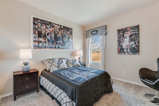 carpeted bedroom with baseboards