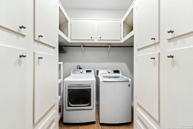 26823 Rustic Brk, San Antonio, TX 78261 - clothes washing area featuring washer and dryer and cabinet space