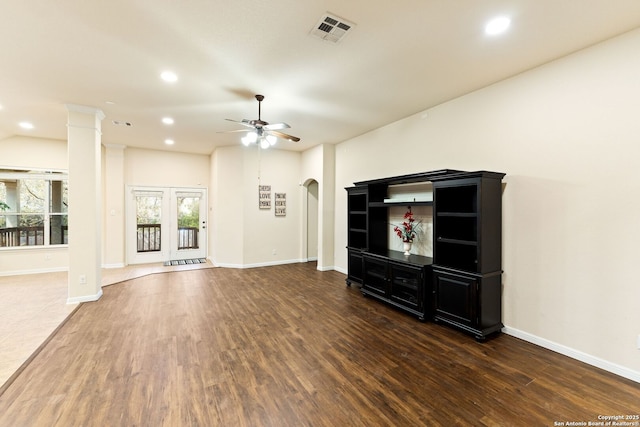 26823 Rustic Brk, San Antonio, TX 78261 - unfurnished living room featuring visible vents, a ceiling fan, wood finished floors, recessed lighting, and arched walkways