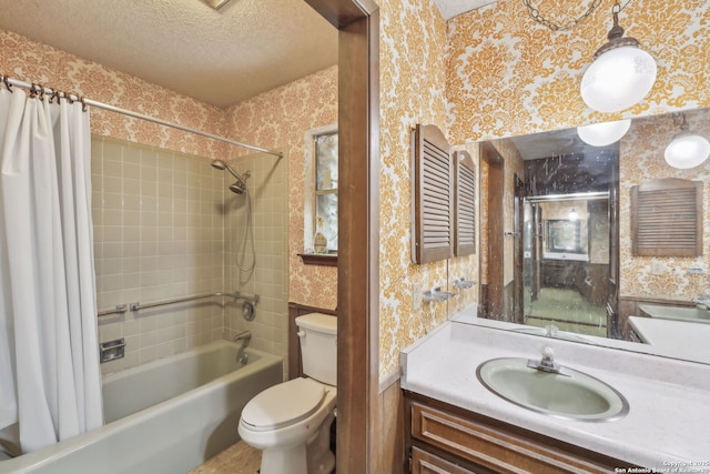 10103 Northampton, San Antonio, TX 78230 - full bath with wallpapered walls, shower / bath combo with shower curtain, toilet, a textured ceiling, and vanity