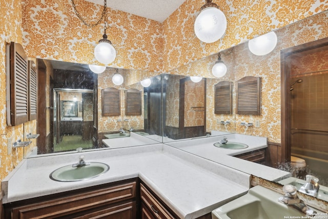 10103 Northampton, San Antonio, TX 78230 - bathroom featuring wallpapered walls, an enclosed shower, vanity, and toilet