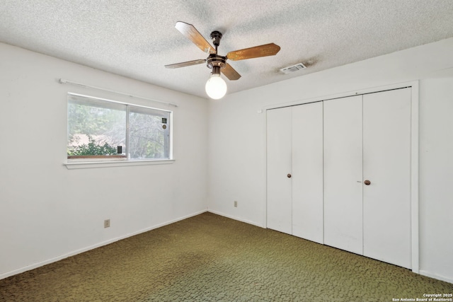 10103 Northampton, San Antonio, TX 78230 - unfurnished bedroom featuring a textured ceiling, a closet, carpet flooring, a ceiling fan, and baseboards