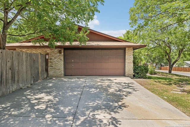 10103 Northampton, San Antonio, TX 78230 - garage featuring concrete driveway