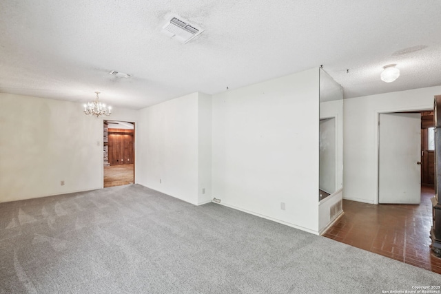10103 Northampton, San Antonio, TX 78230 - carpeted spare room featuring a textured ceiling and a chandelier