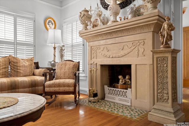 243 E Lullwood, San Antonio, TX 78212 - living area featuring a fireplace, ornamental molding, and wood finished floors