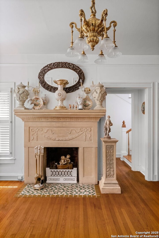 243 E Lullwood, San Antonio, TX 78212 - interior details with wood finished floors, a fireplace, and baseboards