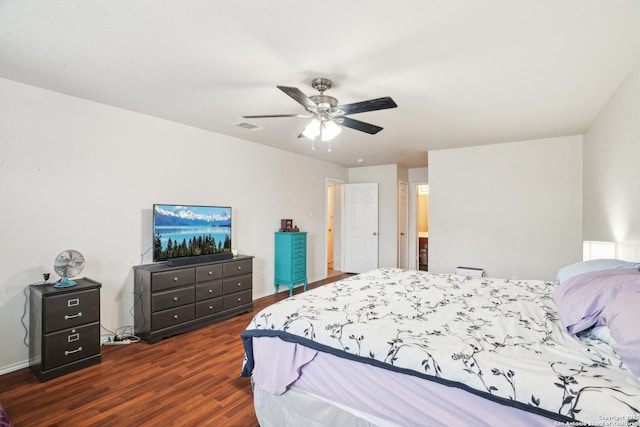 bedroom featuring wood finished floors, ceiling fan, baseboards, and visible vents