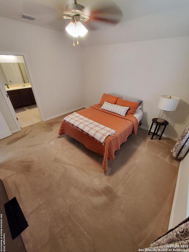 1976 Cowan Dr, New Braunfels, TX 78132 - bedroom with visible vents, light carpet, and baseboards